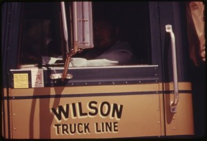 DRIVER_IN_THE_CAB_OF_A_LARGE_CATTLE_TRUCK_IN_COTTONWOOD_FALLS,_KANSAS,_NEAR_EMPORIA._SUCH_VEHICLES_AND_HORSES_ARE_THE..._-_NARA_-_557044.tif